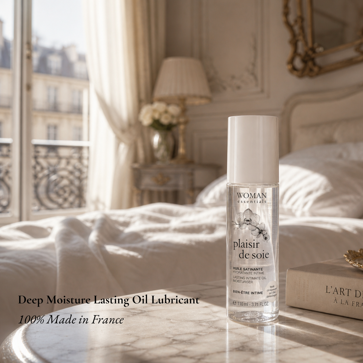 Bottle of 'plaisir de soie' lubricant on a marble surface with a bedroom background